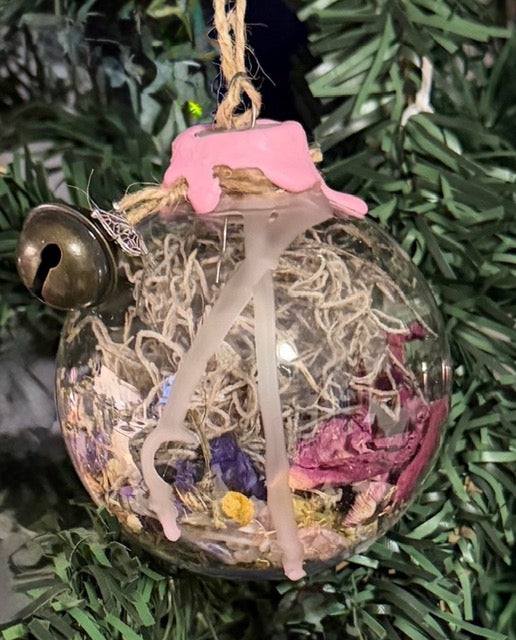 Handmade Self-Love & Harmony Witch Ball with pink wax, Spanish moss, botanicals, crystals, and bell
